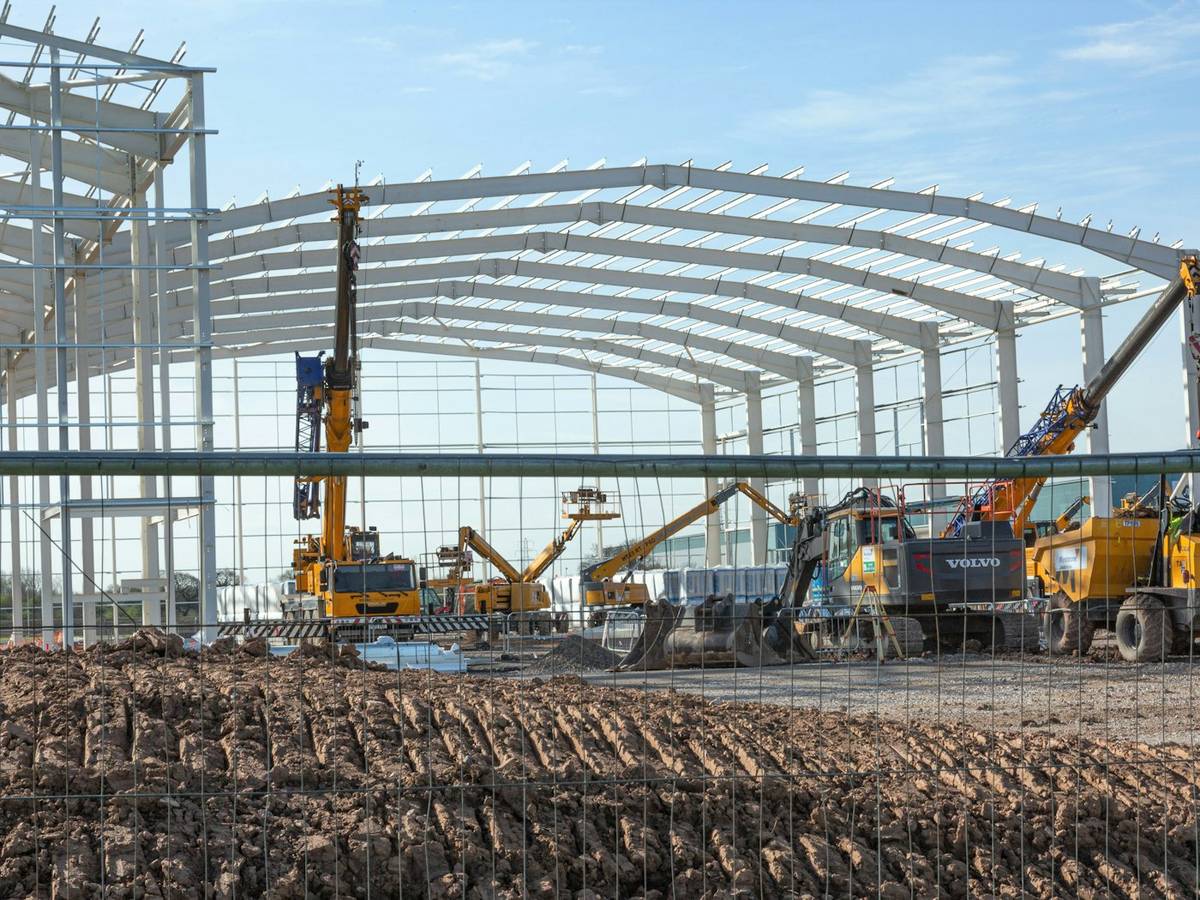 Structural steel arches of an industrial building under construction
